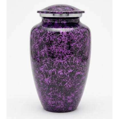 Purple and black textured stone patterned cremation urn on a white background